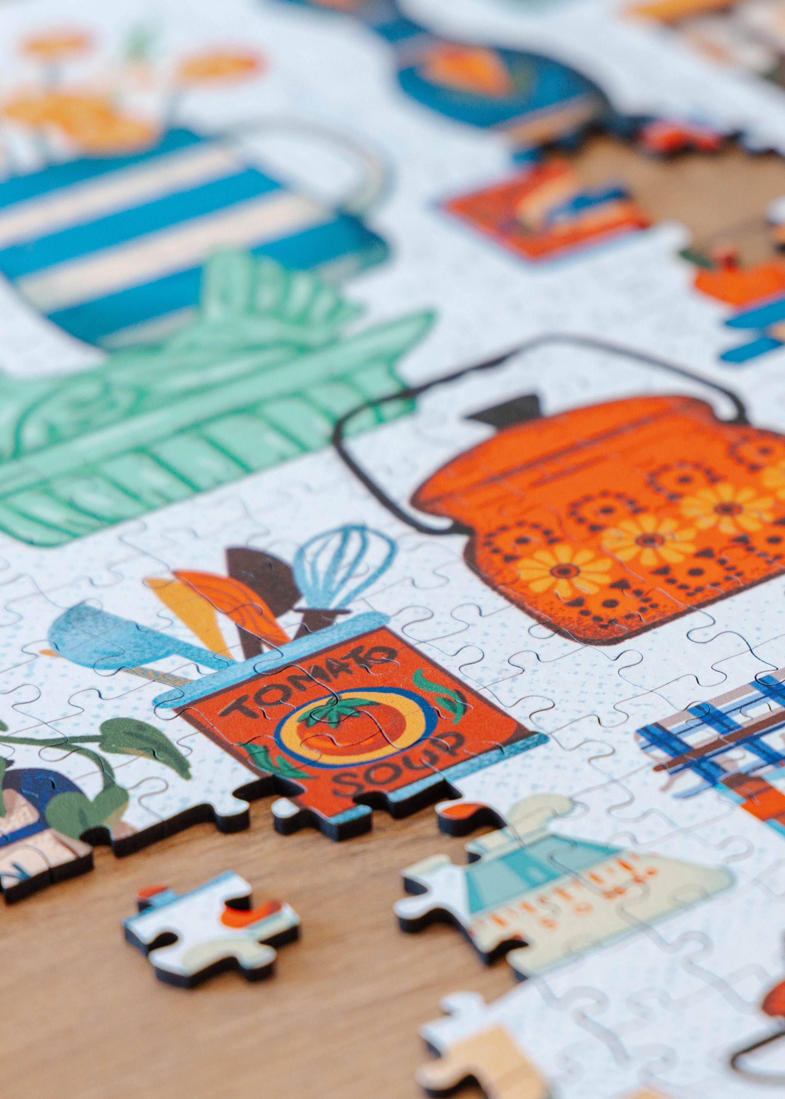 Puzzle with colorful illustrations of kitchen items and animals.