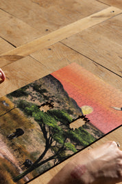 Kruger National Park is a MasterPiece wooden jigsaw puzzle from the African Odyssey poster series designed to showcase Africa’s most iconic natural wonders. 
Precision-cut from 3mm thick wood and expertly printed, our MasterPiece puzzles offer a tactile and satisfying puzzling experience like no other. They are perfect for art lovers, nature enthusiasts and anyone looking for a thoughtful gift.