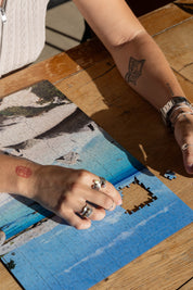 Boulders Beach is a MasterPiece wooden jigsaw puzzle from the African Odyssey poster series designed to showcases Africa’s most iconic natural wonders. Boulders Beach is a haven for African penguins.Precision-cut from 3mm thick wood and expertly printed, our MasterPiece puzzles offer a tactile and satisfying puzzling experience like no other. They are perfect for art lovers, nature enthusiasts and anyone looking for a thoughtful gift.