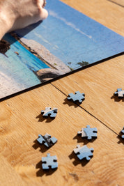 Boulders Beach is a MasterPiece wooden jigsaw puzzle from the African Odyssey poster series designed to showcases Africa’s most iconic natural wonders. Boulders Beach is a haven for African penguins.Precision-cut from 3mm thick wood and expertly printed, our MasterPiece puzzles offer a tactile and satisfying puzzling experience like no other. They are perfect for art lovers, nature enthusiasts and anyone looking for a thoughtful gift.