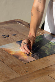 Stellenbosch is a MasterPiece wooden jigsaw puzzle from the African Odyssey poster series designed to showcase Africa’s most iconic natural wonders. This design captures one of the country's oldest towns renowned wine region. Precision-cut from 3mm thick wood and expertly printed, our MasterPiece puzzles offer a tactile and satisfying puzzling experience like no other. They are perfect for art lovers, nature enthusiasts and anyone looking for a thoughtful gift.
