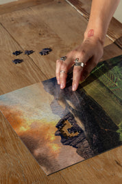 Stellenbosch is a MasterPiece wooden jigsaw puzzle from the African Odyssey poster series designed to showcase Africa’s most iconic natural wonders. This design captures one of the country's oldest towns renowned wine region. Precision-cut from 3mm thick wood and expertly printed, our MasterPiece puzzles offer a tactile and satisfying puzzling experience like no other. They are perfect for art lovers, nature enthusiasts and anyone looking for a thoughtful gift.