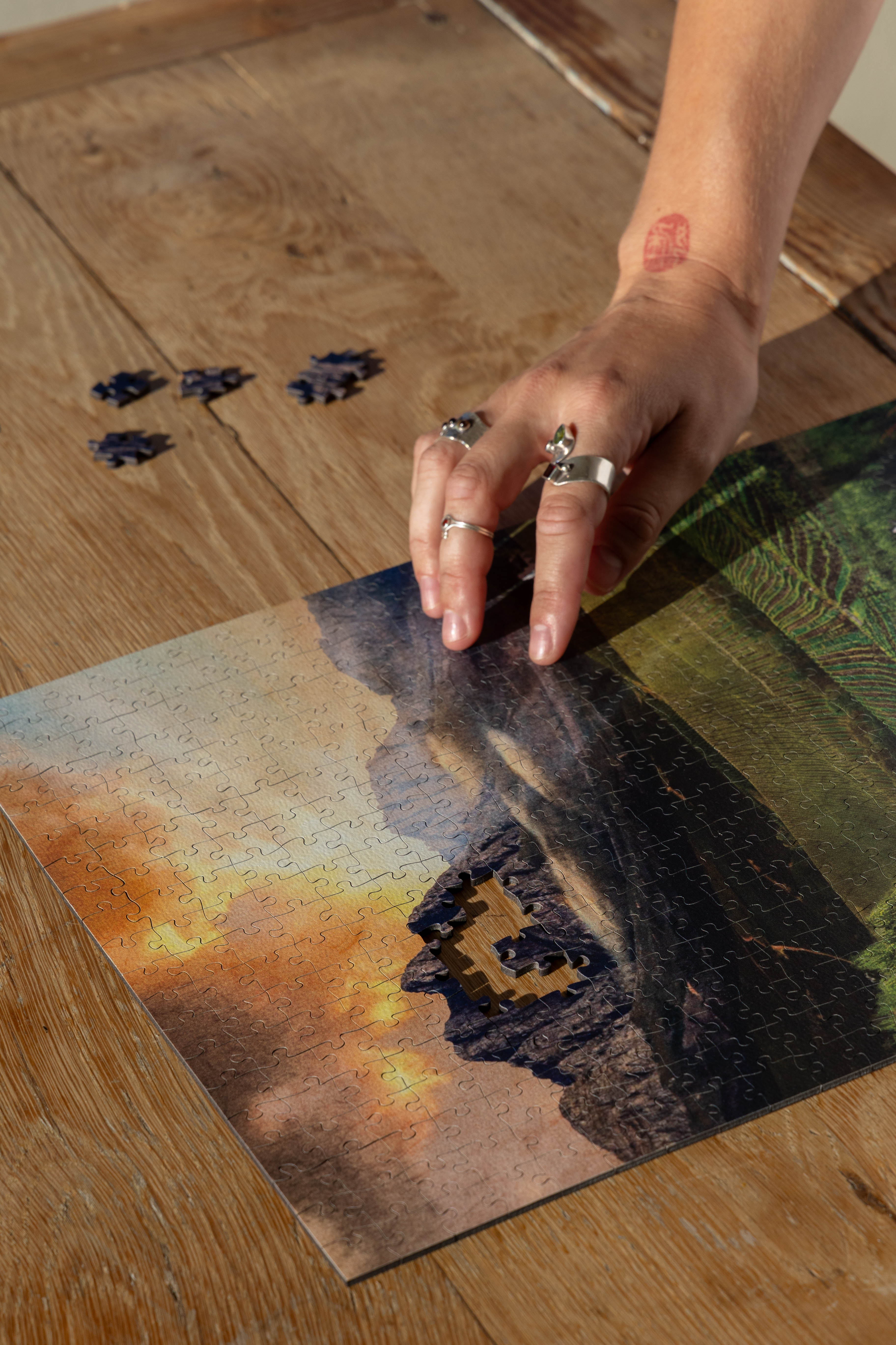Stellenbosch is a MasterPiece wooden jigsaw puzzle from the African Odyssey poster series designed to showcase Africa’s most iconic natural wonders. This design captures one of the country's oldest towns renowned wine region. Precision-cut from 3mm thick wood and expertly printed, our MasterPiece puzzles offer a tactile and satisfying puzzling experience like no other. They are perfect for art lovers, nature enthusiasts and anyone looking for a thoughtful gift.