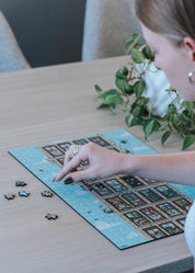 Person working on a Lockdown MasterPiece 3mm wooden puzzle.