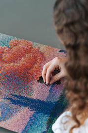 The Pink Cloud is a MasterPiece wooden jigsaw puzzle of a serene landscape featuring a soft, glowing sky. This artwork captures Henri-Edmond Cross’s expressive use of colour and atmosphere.

Precision-cut from 3mm thick wood and expertly printed, our MasterPiece puzzles offer a tactile and satisfying puzzling experience like no other. They are perfect for classic art lovers and anyone looking for a thoughtful gift. 