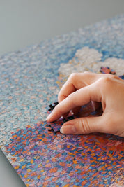 The Pink Cloud is a MasterPiece wooden jigsaw puzzle of a serene landscape featuring a soft, glowing sky. This artwork captures Henri-Edmond Cross’s expressive use of colour and atmosphere.

Precision-cut from 3mm thick wood and expertly printed, our MasterPiece puzzles offer a tactile and satisfying puzzling experience like no other. They are perfect for classic art lovers and anyone looking for a thoughtful gift. 