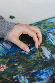 Water Lilies and Japanese Bridge is a&nbsp;MasterPiece wooden jigsaw puzzle&nbsp;of one of Claude Monet’s iconic paintings. This is an Impressionist masterpiece portraying his garden in Giverny. The painting features a serene pond covered in floating water lilies, with a softly arched Japanese bridge overhead.&nbsp;

Precision-cut from 3mm wood and expertly printed, our MasterPiece puzzles offer a tactile and satisfying puzzling experience like no other. They are perfect for&nbsp;classic&nbsp;art lovers&nbs