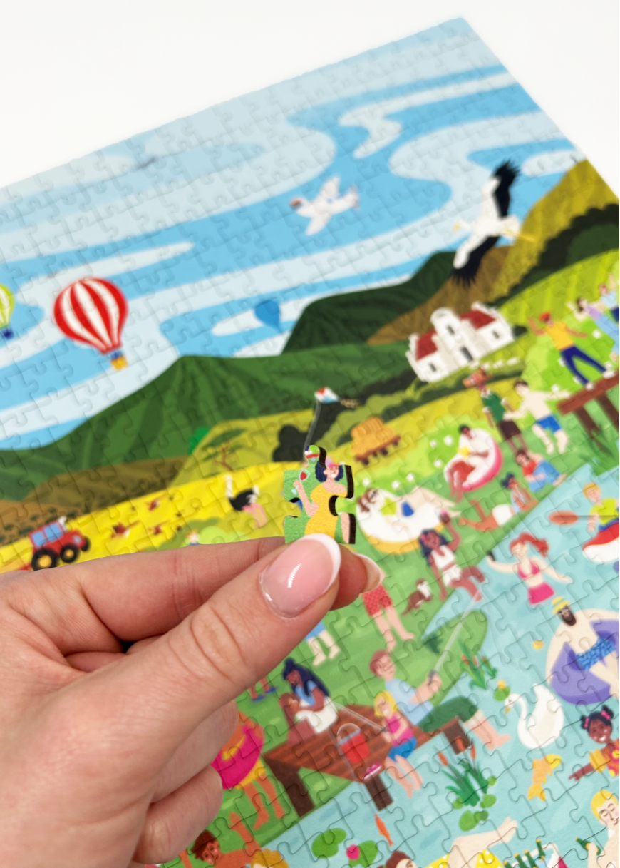 Along The Breede is a premium wooden jigsaw puzzle that features a vibrant and playful illustration that captures the energy of a summer day along the Breede river in the Western Cape. Bursting with intricate details, this puzzle is as fun to explore as it is to complete. This puzzle is ideal for adults, art lovers and gift buyers.