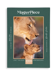 A premium wooden jigsaw puzzle that features a beautiful photograph of a lioness cleaning her cub, taken by local wildlife photographer, Hendri Venter.
Perfect for wildlife lovers, nature enthusiasts and thoughtful gift buyers, Bath Time makes a meaningful gift for birthdays, holidays, housewarmings or anyone who enjoys working with their hands and mind.