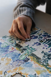Garden of the Painter at Saint Clair is a MasterPiece wooden jigsaw puzzle of one of Henri-Edmond Cross’s paintings. This artwork captures a sunlit garden overflowing with vibrant greenery and blooming flowers. 

Precision-cut from 3mm thick wood and expertly printed, our MasterPiece puzzles offer a tactile and satisfying puzzling experience like no other. They are perfect for classic art lovers and anyone looking for a thoughtful gift. 