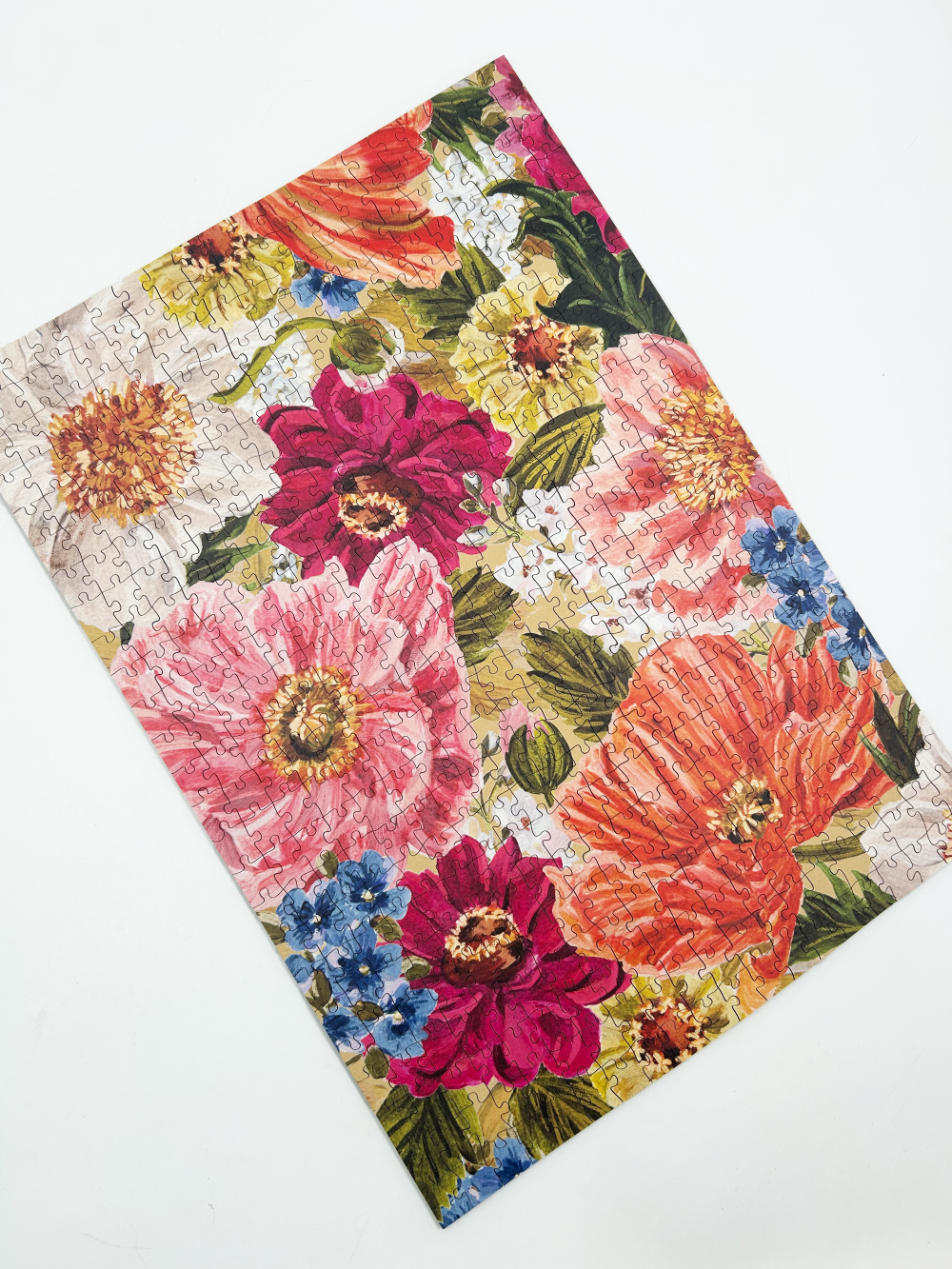 Floral-patterned puzzle with vibrant colors on a white background
