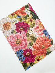 Floral-patterned puzzle with vibrant colors on a white background
