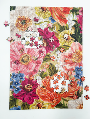 Floral puzzle with a partially completed design on a white background