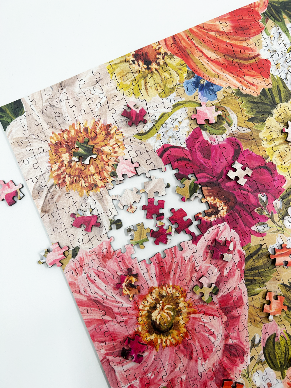 Floral puzzle with completed sections on a white background