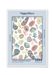 Sea Shells is a MasterPiece wooden jigsaw puzzle that features a delicate watercolour scene of seashells, coral and seaweed. This wooden puzzle transports you to the summer shoreline and can be beautifully framed as a work of art once complete. Precision-cut from 3mm wood and expertly printed, our MasterPiece puzzles offer a tactile and satisfying puzzling experience like no other. They are perfect for art lovers, beach enthusiasts and anyone looking for a thoughtful gift.