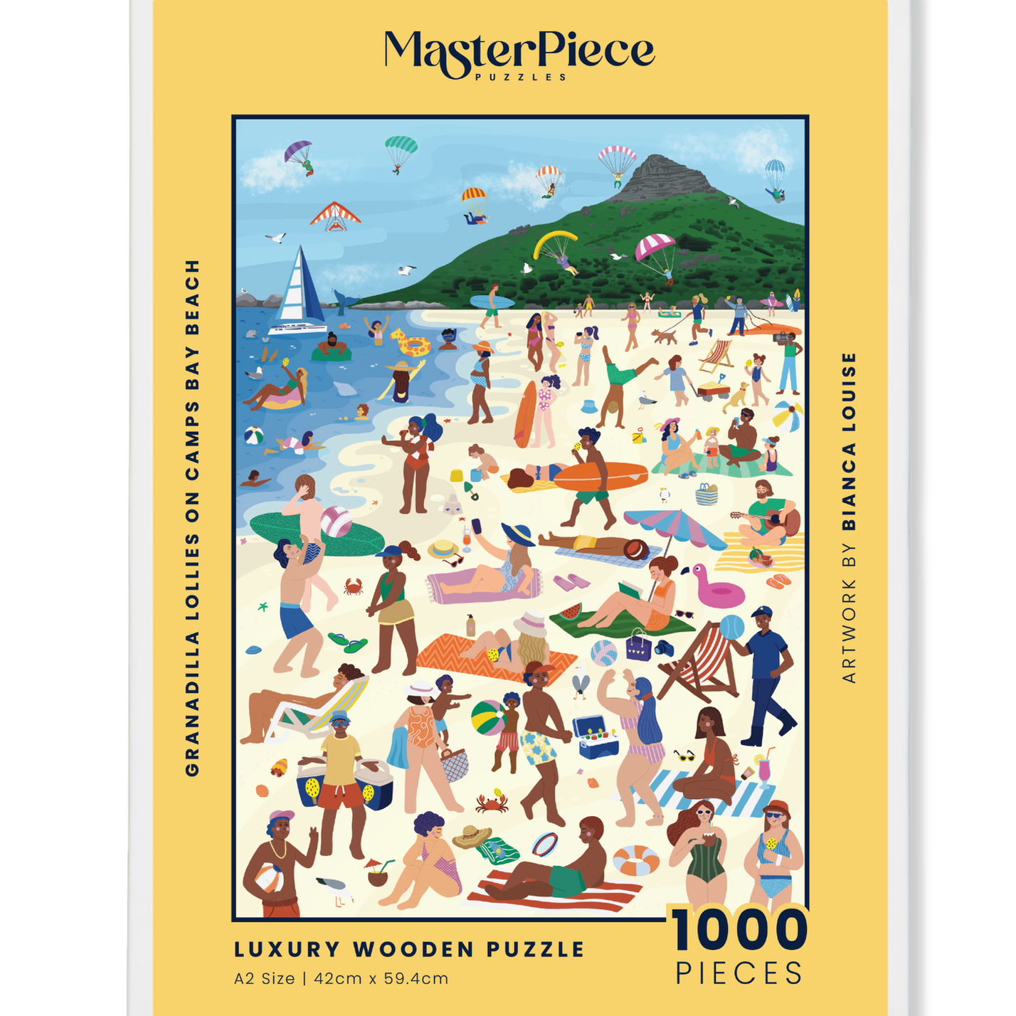 MasterPiece puzzle box with a beach scene illustration on a yellow background. Wooden jigsaw puzzle showing people and granadilla lollies on Camps Bay Beach in Cape Town