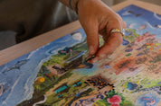 South Africa is a MasterPiece wooden jigsaw puzzle that brings together the landscapes, wildlife and iconic landmarks that make our country so special. From waves to wild bushveld to colourful flora and familiar scenes, each detail celebrates the richness of Mzansi. This is home.
