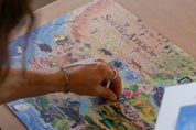 South Africa is a MasterPiece wooden jigsaw puzzle that brings together the landscapes, wildlife and iconic landmarks that make our country so special. From waves to wild bushveld to colourful flora and familiar scenes, each detail celebrates the richness of Mzansi. This is home.