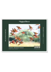 Bee-Eaters In Motion is a premium wooden jigsaw puzzle that features a beautiful photograph of Southern Carmine Bee-eaters swarming across the sky, taken by local wildlife photographer, Danielle Carstens. Perfect for wildlife lovers, nature enthusiasts and thoughtful gift buyers.