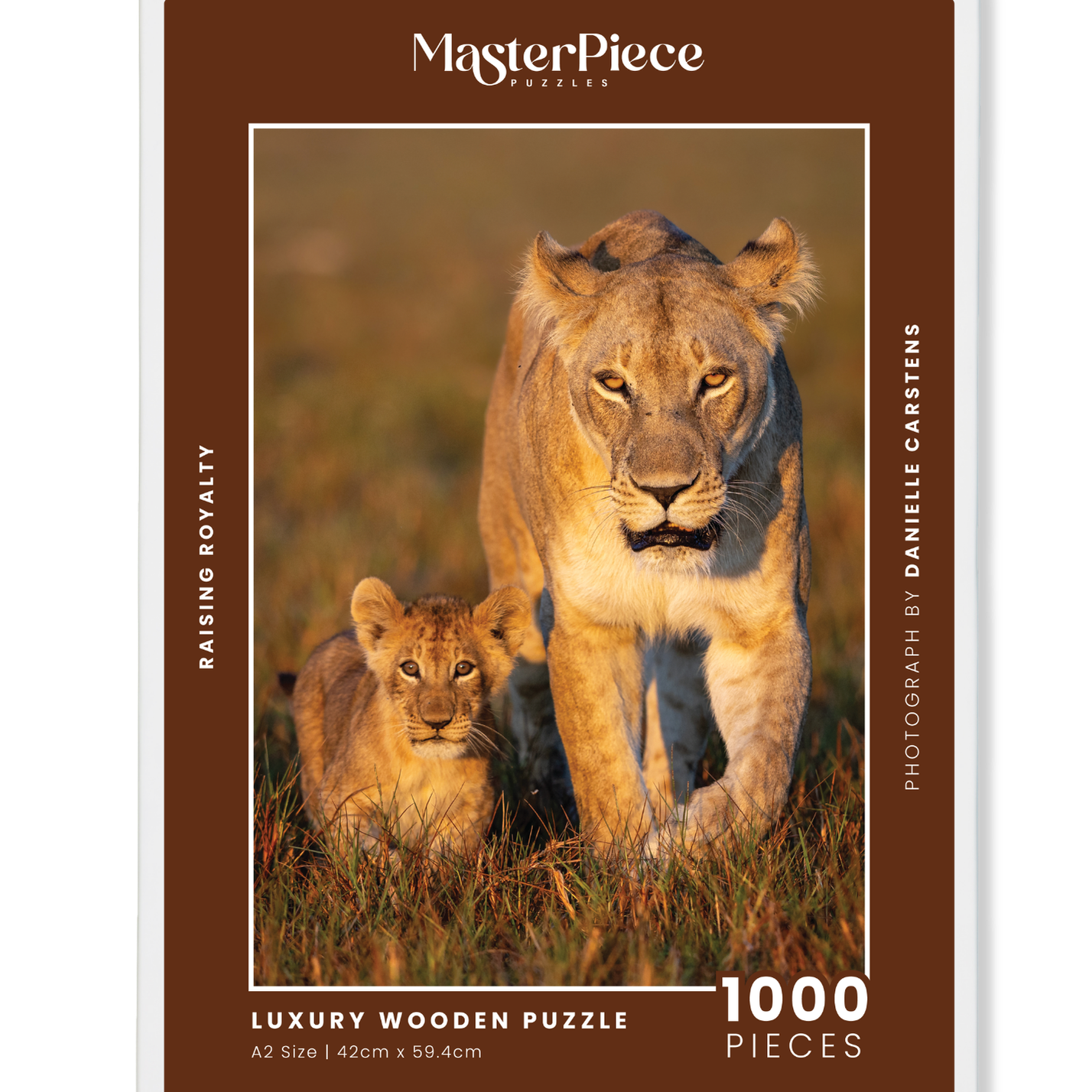 Raising Royalty is  MasterPiece wooden jigsaw puzzle that features a beautiful photograph of a lioness and her cub.

Precision-cut from 3mm wood and expertly printed, our MasterPiece puzzles offer a tactile and satisfying puzzling experience like no other. They are perfect for wildlife lovers, nature enthusiasts and anyone looking for a thoughtful gift.
