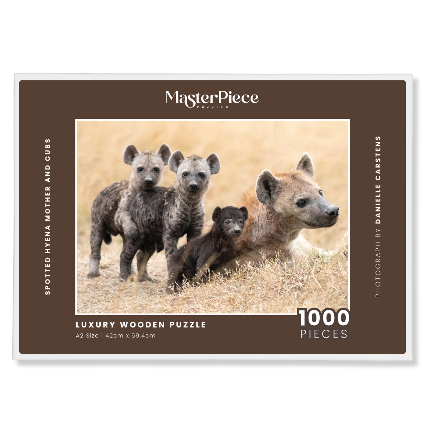 Spotted Hyena Mother And Cubs is a MasterPiece wooden jigsaw puzzle that features a beautiful photograph of a hyena and her three cubs.

Precision-cut from 3mm wood and expertly printed, our MasterPiece puzzles offer a tactile and satisfying puzzling experience like no other. They are perfect for wildlife lovers, nature enthusiasts and anyone looking for a thoughtful gift.