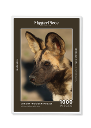 Watchful is a MasterPiece wooden jigsaw puzzle featuring a striking portrait photograph of a wild dog.

Precision-cut from 3mm thick wood and expertly printed, our MasterPiece puzzles offer a tactile and satisfying puzzling experience like no other. They are perfect for wildlife lovers, nature enthusiasts and anyone looking for a thoughtful gift.