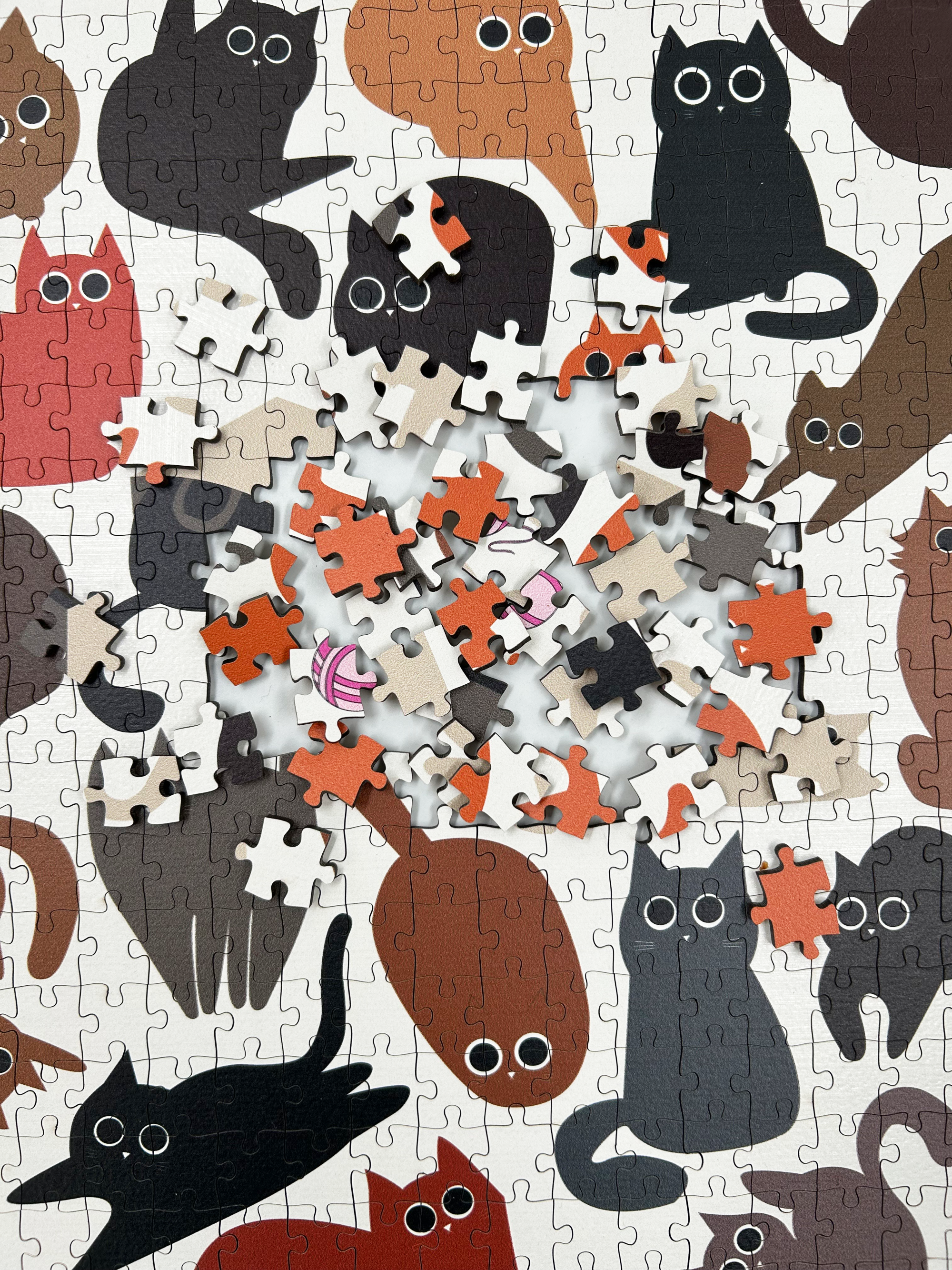 MasterPiece Puzzles luxury wooden puzzle of cats. A great gift idea for cat lovers and puzzlers. Also can be framed as artwork for wall decor once complete.