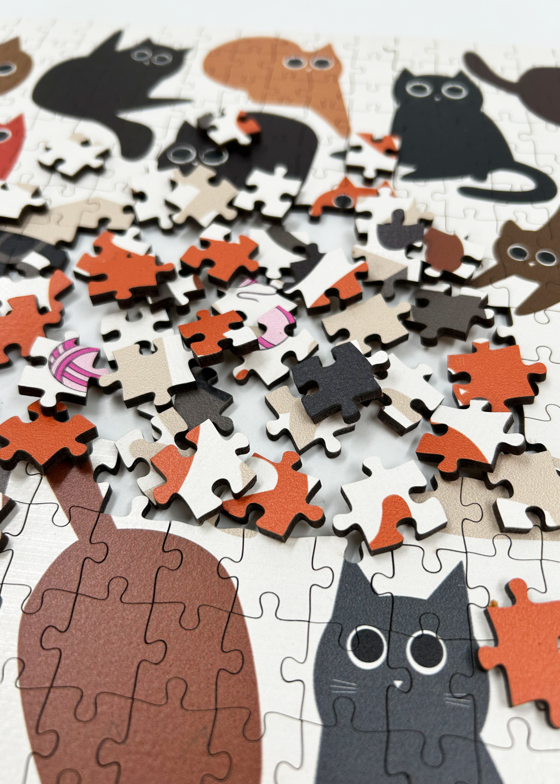MasterPiece Puzzles luxury wooden puzzle of cats. A great gift idea for cat lovers and puzzlers. Also can be framed as artwork for wall decor once complete.