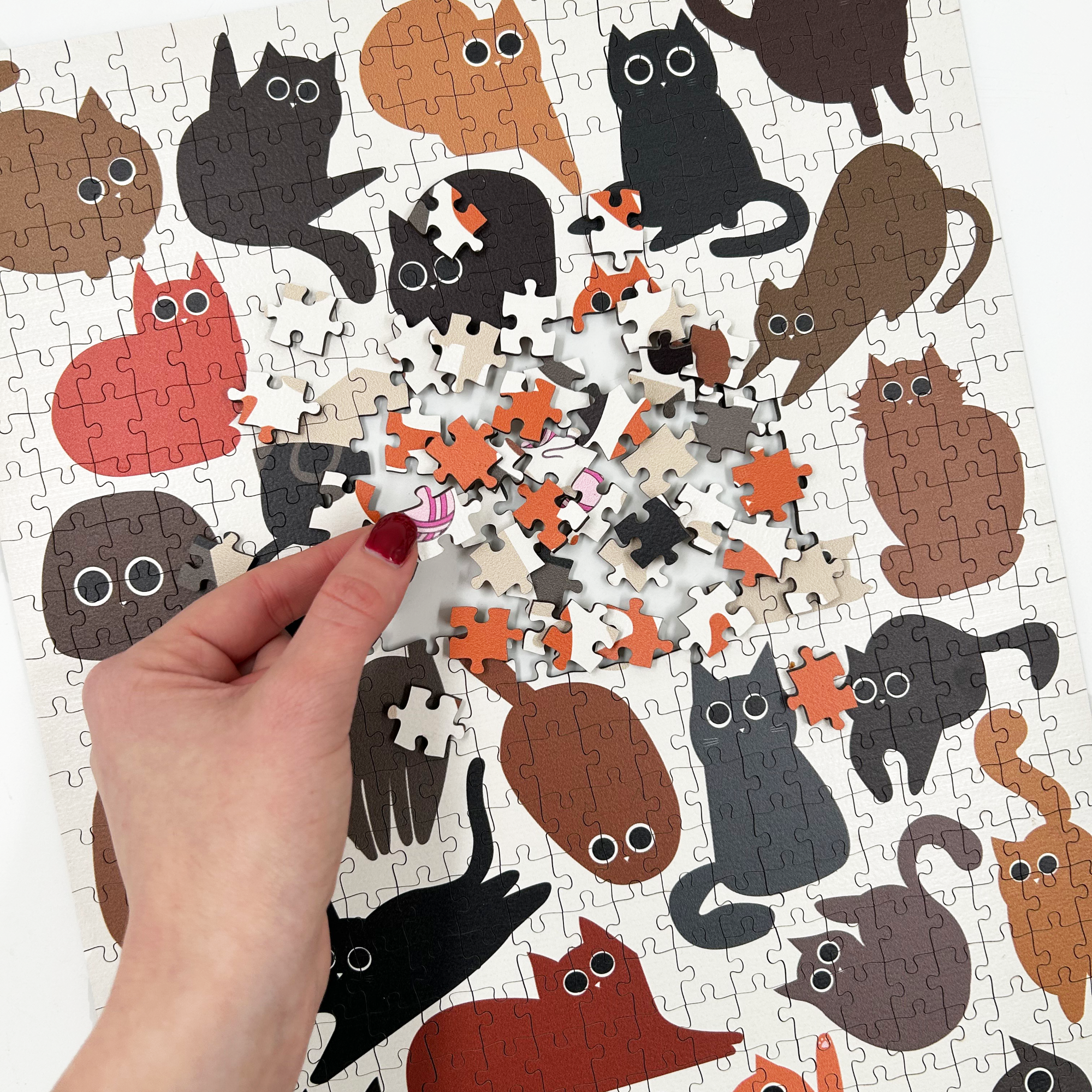 MasterPiece Puzzles luxury wooden puzzle of cats. A great gift idea for cat lovers and puzzlers. Also can be framed as artwork for wall decor once complete.