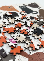 Curious Cats is a MasterPiece wooden jigsaw puzzle featuring a delightful collection of curious cats in various poses and playful scenes. This charming puzzle is a must-have for cat lovers! Precision-cut from 3mm thick wood and expertly printed, our MasterPiece puzzles offer a tactile and satisfying puzzling experience like no other. like no other. This puzzle is perfect for 'crazy cat ladies', art lovers and anyone looking for a thoughtful gift.