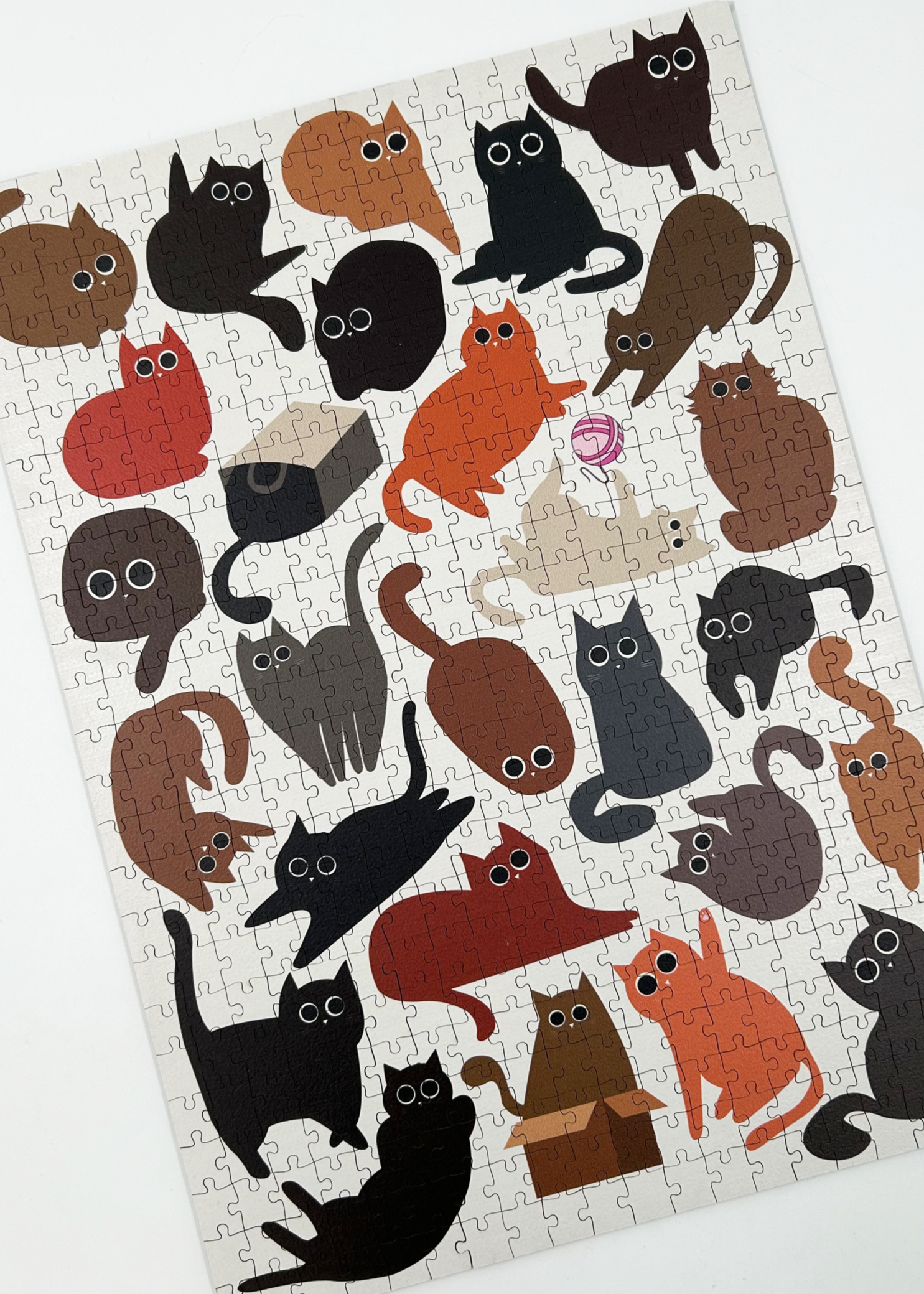 Curious Cats is a MasterPiece wooden jigsaw puzzle featuring a delightful collection of curious cats in various poses and playful scenes. This charming puzzle is a must-have for cat lovers! Precision-cut from 3mm thick wood and expertly printed, our MasterPiece puzzles offer a tactile and satisfying puzzling experience like no other. like no other. This puzzle is perfect for 'crazy cat ladies', art lovers and anyone looking for a thoughtful gift.