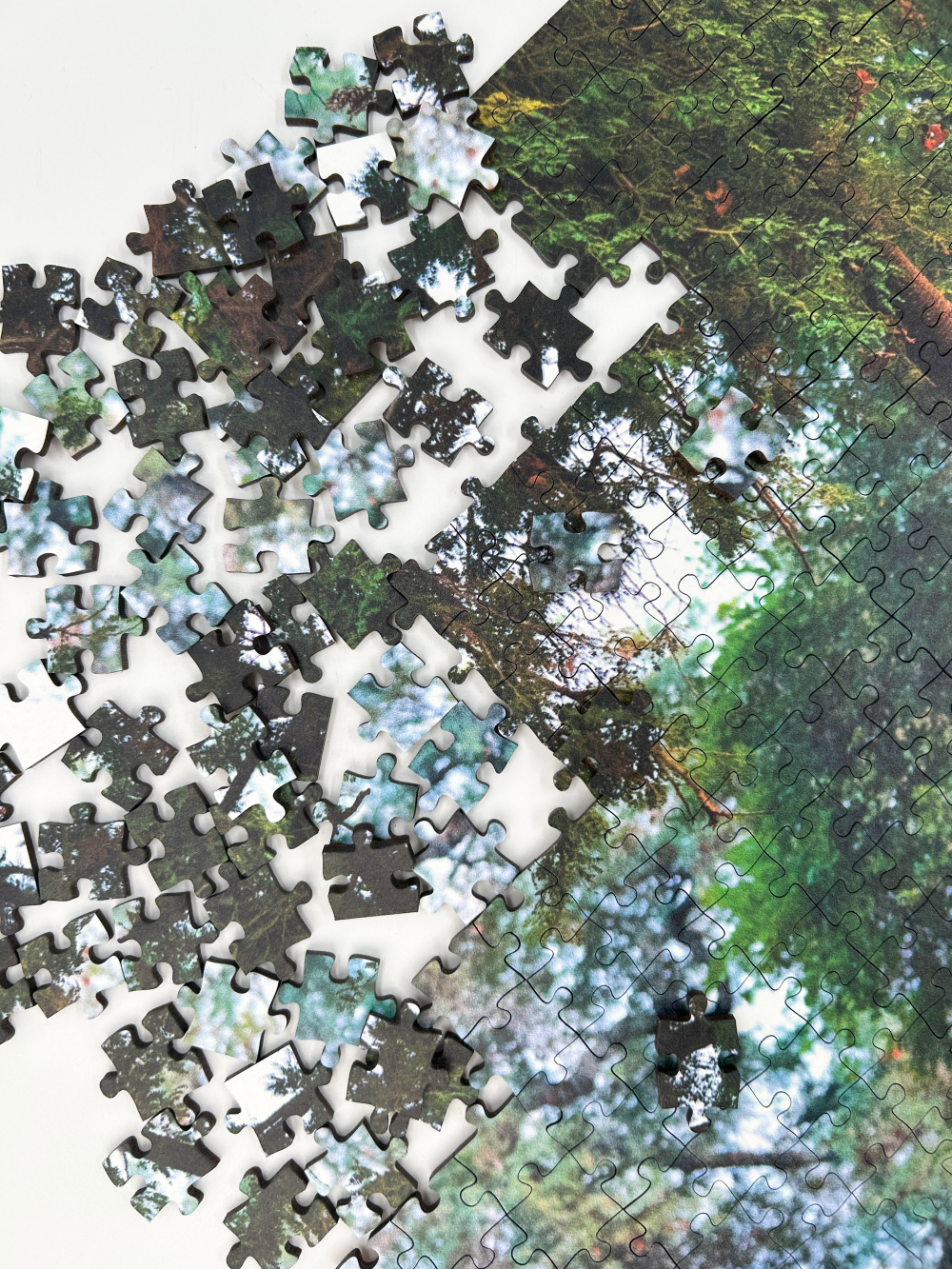 A wooden jigsaw puzzle featuring a striking photograph of an elephant. Perfect for wildlife lovers, nature enthusiasts and anyone looking for a unique gift. 