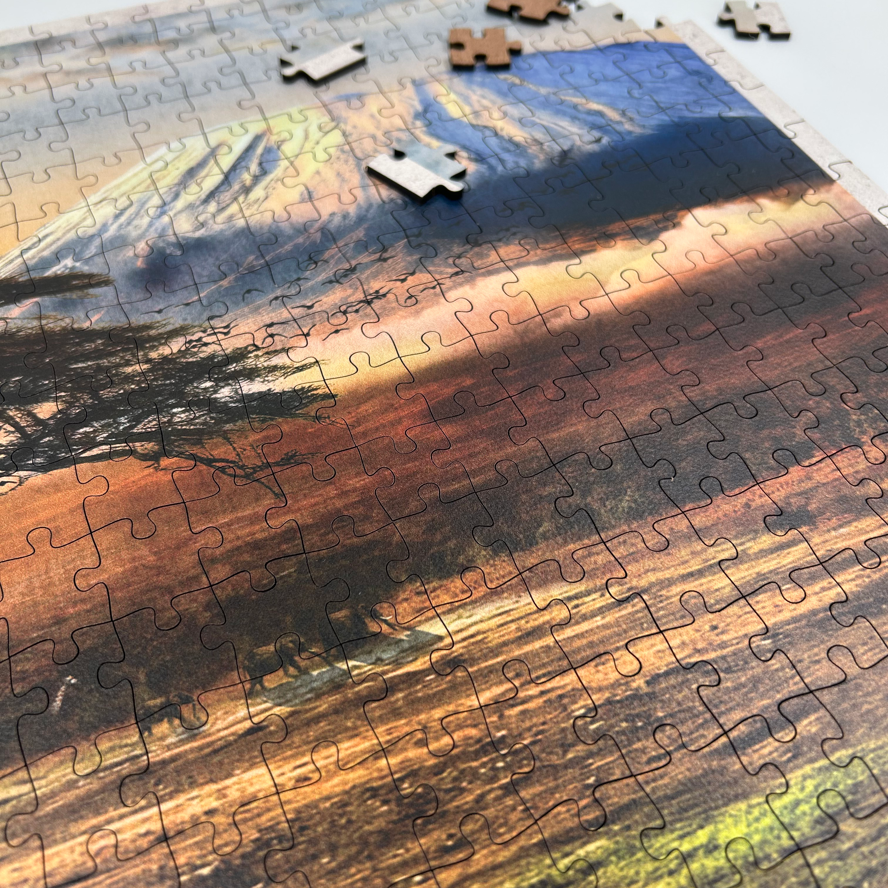 MasterPiece luxury wooden puzzle of African Odyssey Mount Kilimanjaro (with rhinos) poster. Made in Cape Town, South Africa.