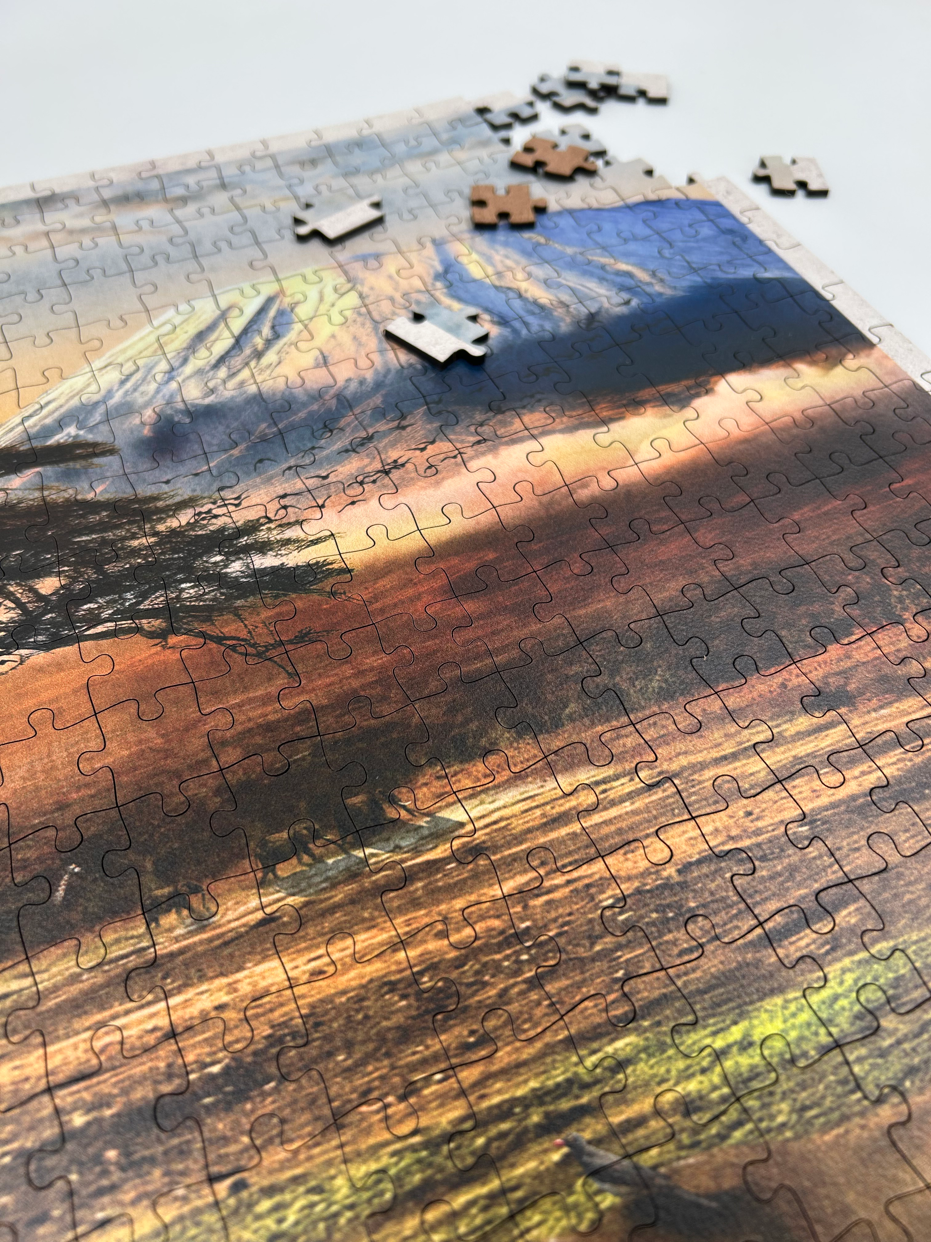 MasterPiece luxury wooden puzzle of African Odyssey Mount Kilimanjaro (with rhinos) poster. Made in Cape Town, South Africa.