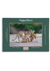 Playful Mischief is a MasterPiece wooden jigsaw puzzle that features a beautiful photograph capturing two lion cubs with one play fighting with the other.

Precision-cut from 3mm wood and expertly printed, our MasterPiece puzzles offer a tactile and satisfying puzzling experience like no other. They are perfect for wildlife lovers, nature enthusiasts and anyone looking for a thoughtful gift. 