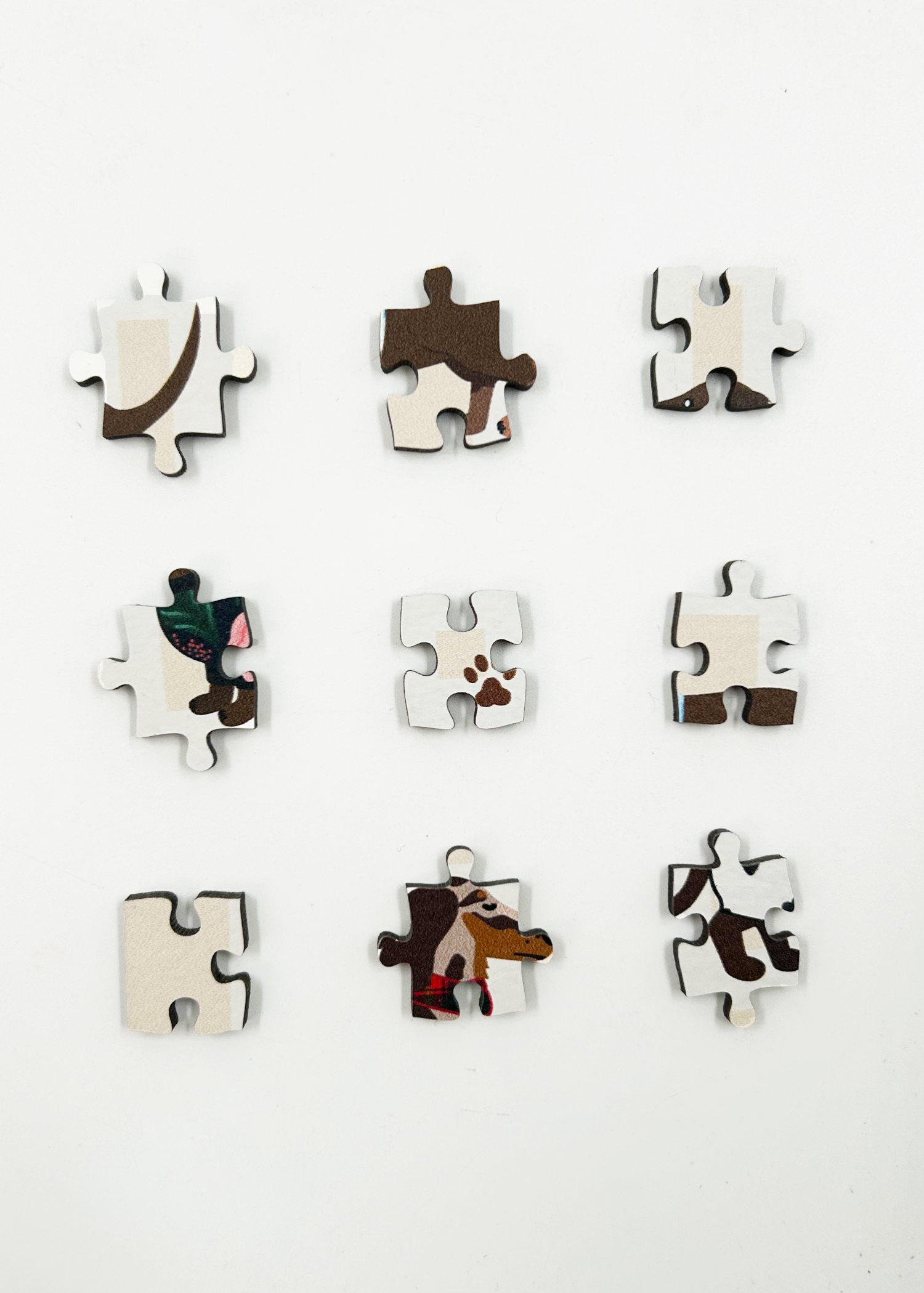 Stylish Sausages is a MasterPiece wooden jigsaw puzzle featuring an adorable line-up of sausage dogs strutting their stuff in various colourful jerseys and scarves, a must-have for dachshund lovers!

Precision-cut from 3mm thick wood and expertly printed, our MasterPiece puzzles offer a tactile and satisfying puzzling experience like no other. This puzzle is perfect for dachshund lovers and anyone looking for a thoughtful gift. 