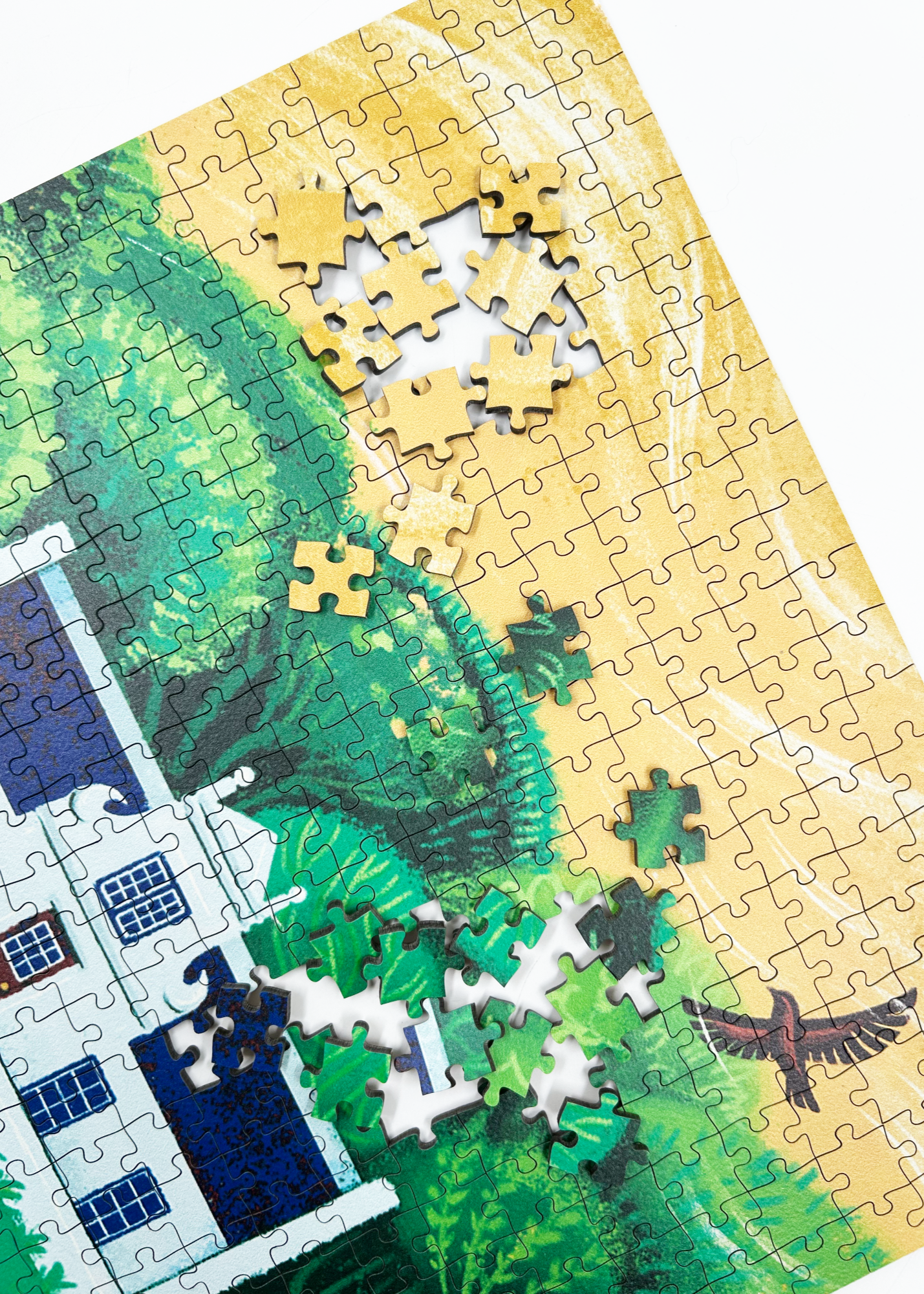 A wooden jigsaw puzzle featuring an illustration of the Zevenwacht Wine Estate manor house. Perfect for art lovers and anyone looking for a thoughtful gift. 