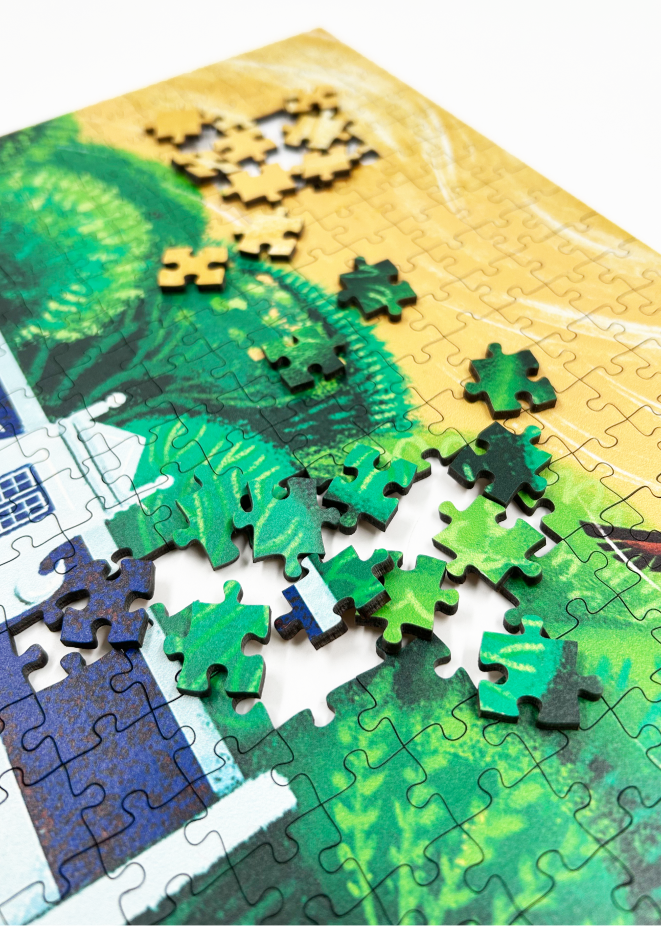 A wooden jigsaw puzzle featuring an illustration of the Zevenwacht Wine Estate manor house. Perfect for art lovers and anyone looking for a thoughtful gift. 